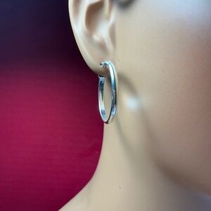 SU Sterling Silver hoop earrings. 1 1/8 inch diameter